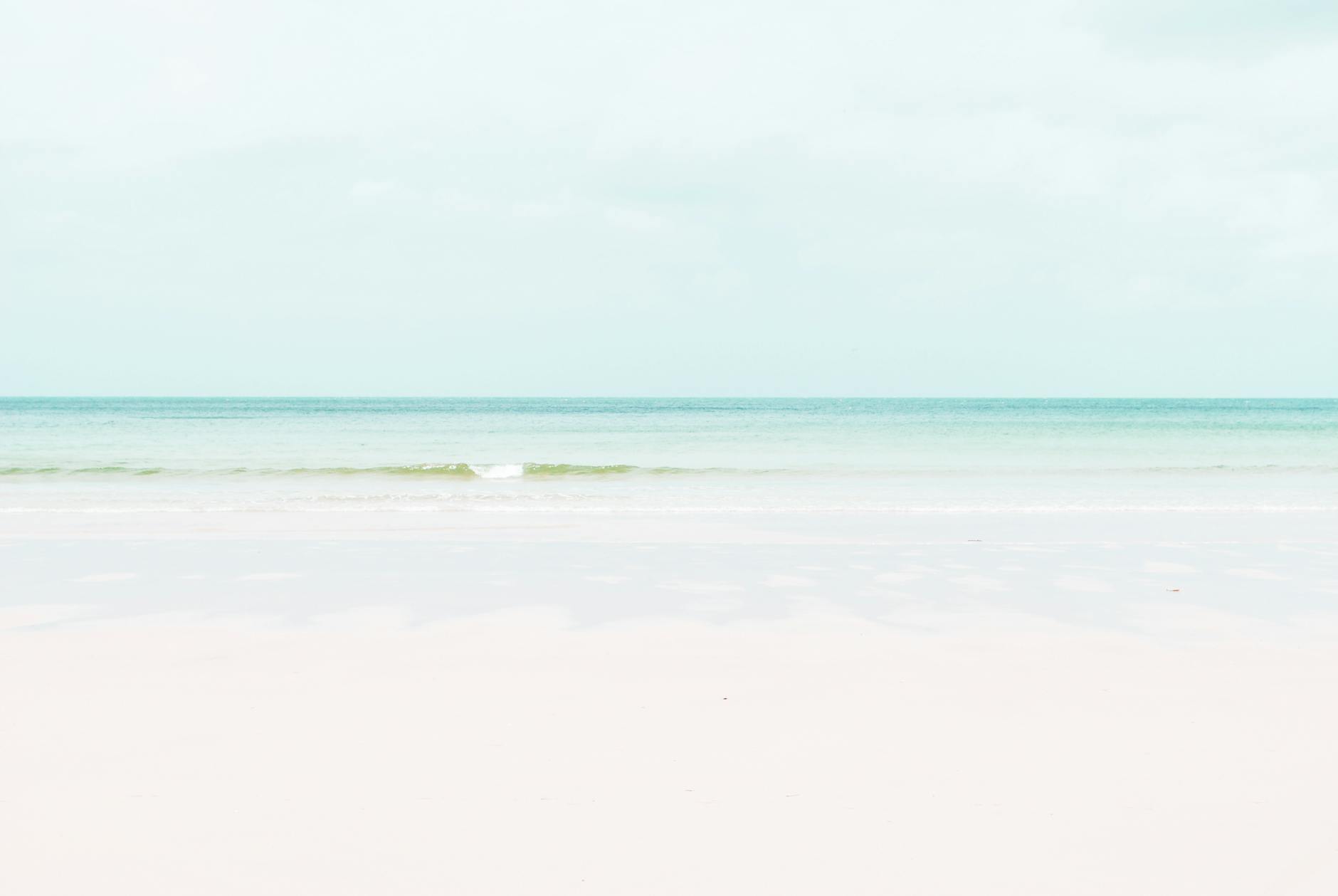 White sand and turquoise waters at Porthcurno Beach Cornwall