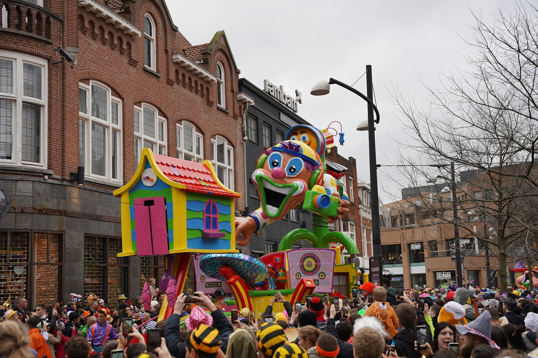 Colourful carnival parade through street - Cornwall events