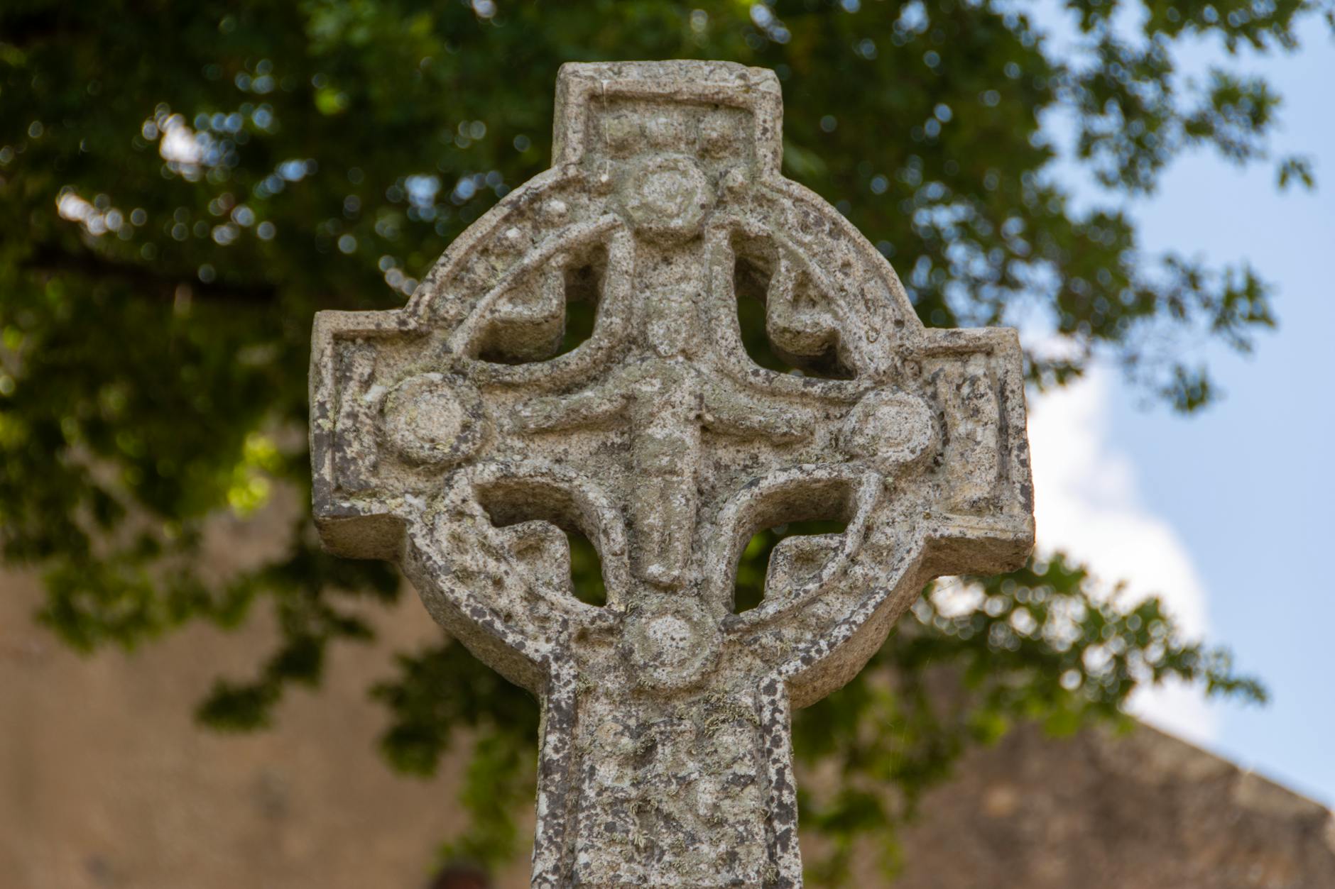 Carved Celtic cross in a churchyard
