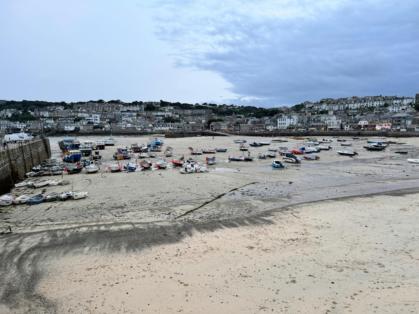 St Ives Cornwall harbour with fishing boats and golden sand
