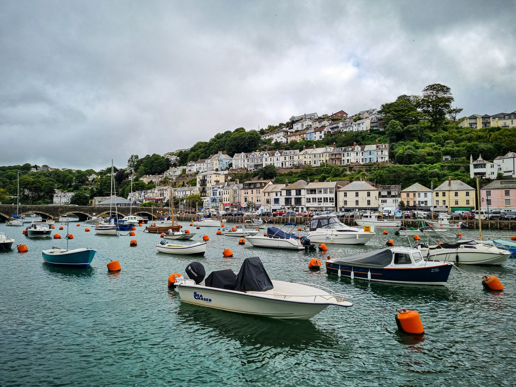 Looe Cornwall harbour with fishing boats East Looe River