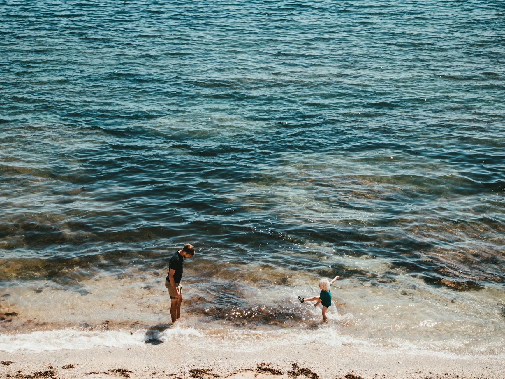 Family attractions Cornwall - children playing on Cornish beach
