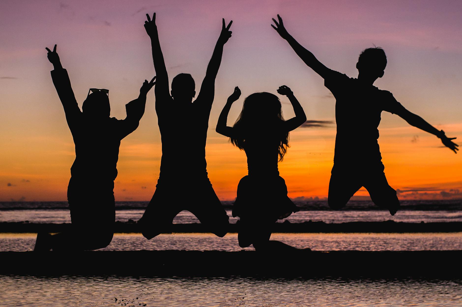 Teenagers on Cornish beach sunset friends
