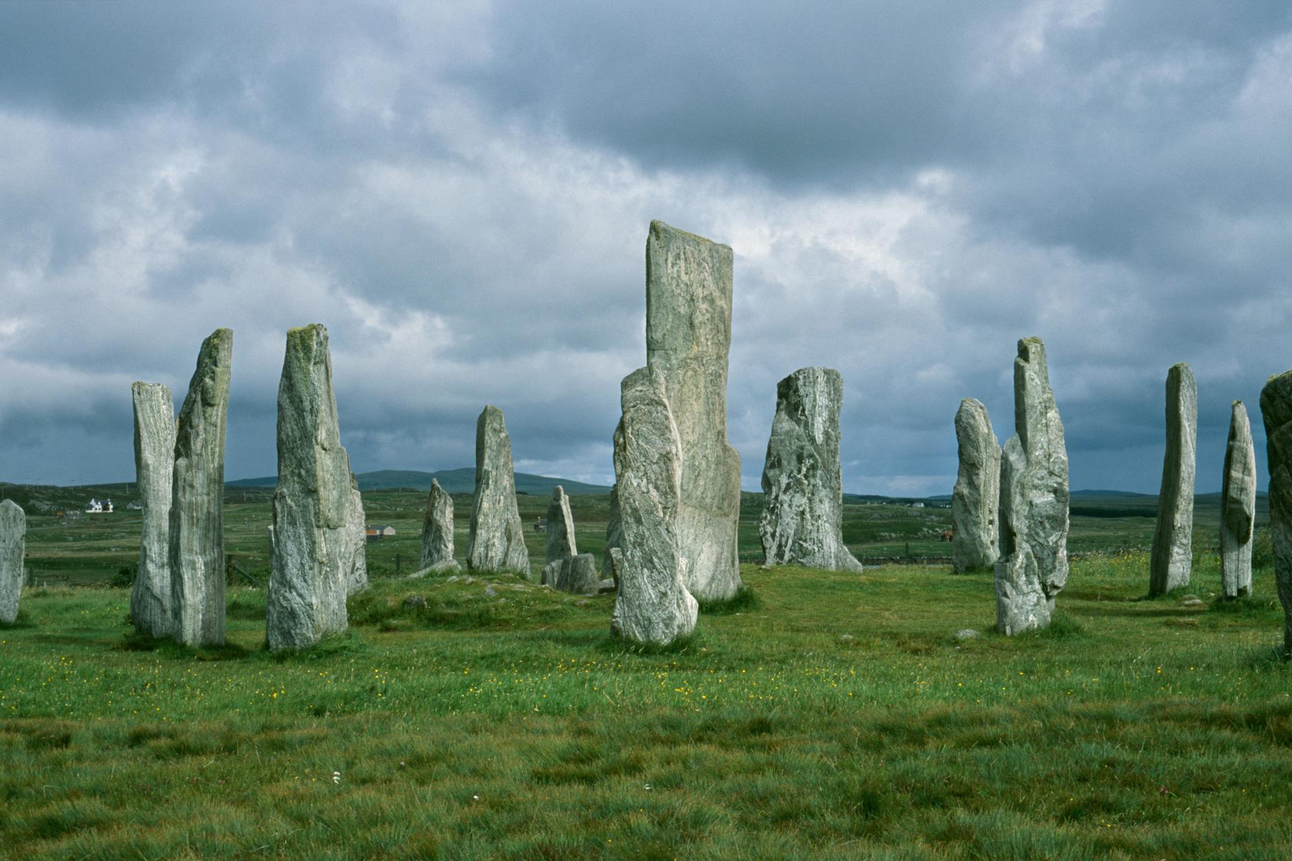 Ancient standing stones in the Cornish landscape at dusk