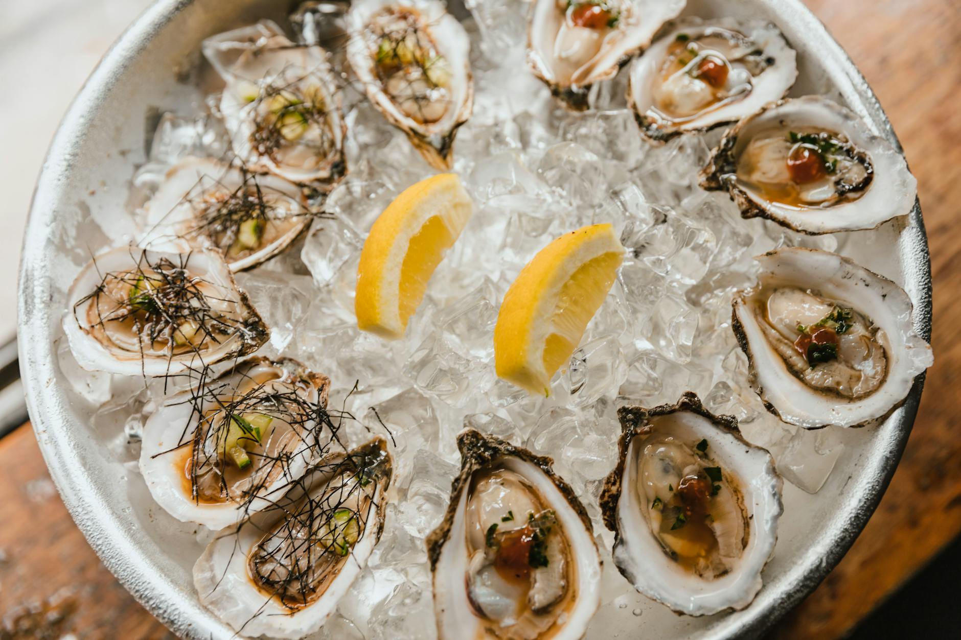 Cornwall food festivals - fresh oysters on ice with lemon