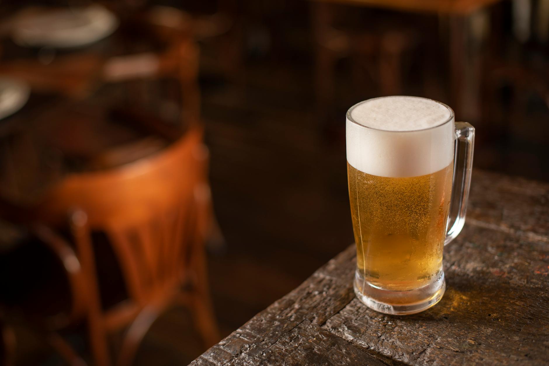 best pubs in Cornwall - pint of ale wooden bar