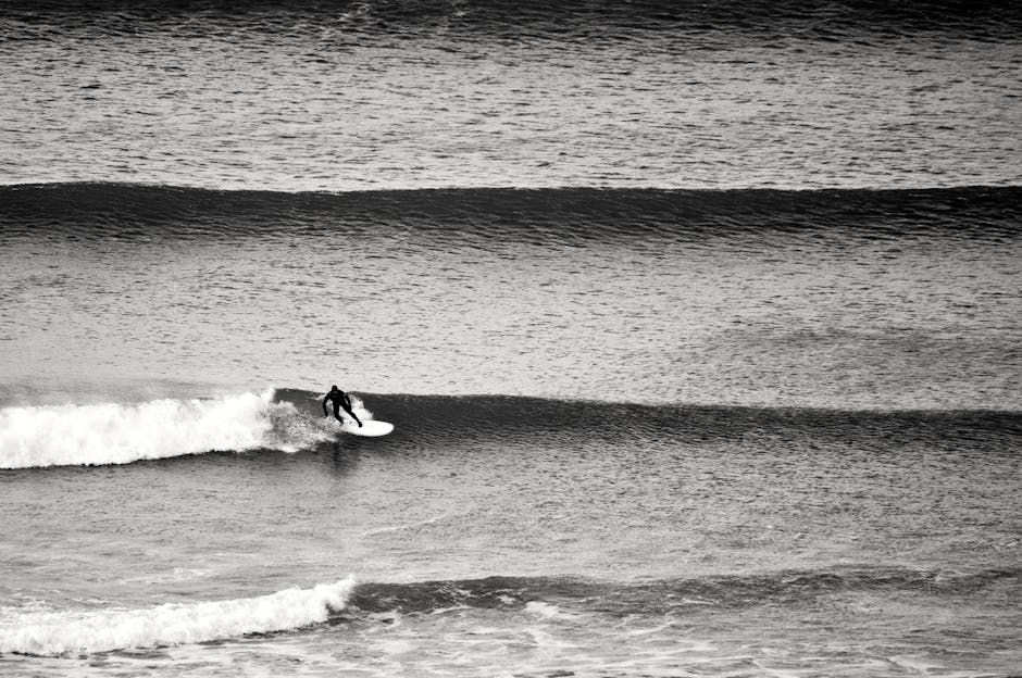 Surfer on big wave Cornwall — advanced surfing beach