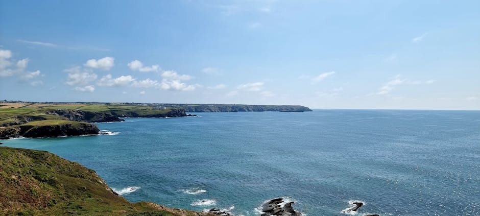Sea view across the rugged Cornwall coastline at sunset