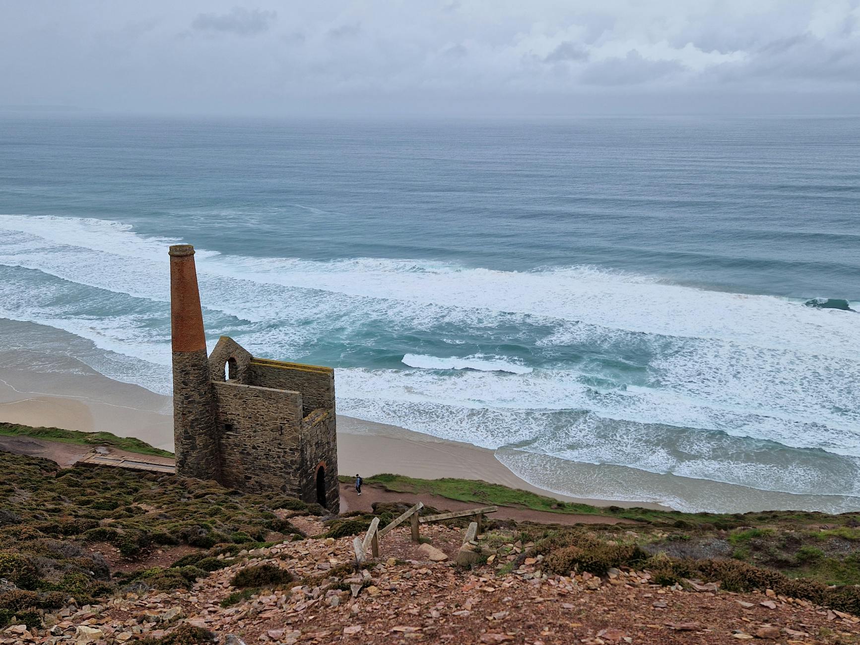 Ruined tin mine engine house on the Cornish clifftop, part of the mining World Heritage Site