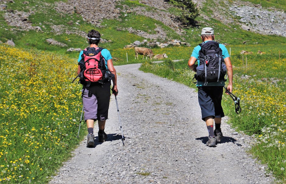 Two hikers walking the South West Coast Path Cornwall