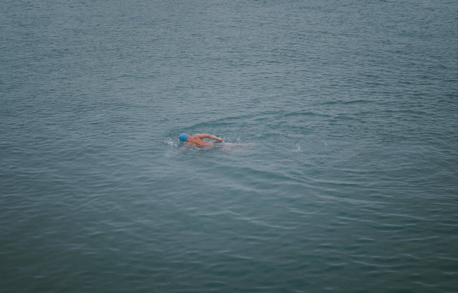 Swimmer in open water, sea swimming Cornwall