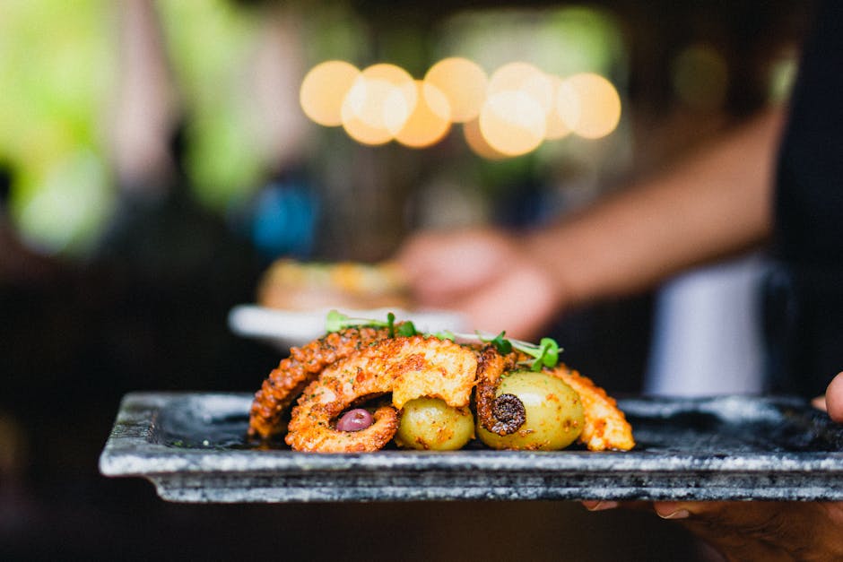 Plated grilled octopus dish — Cornwall fine seafood dining