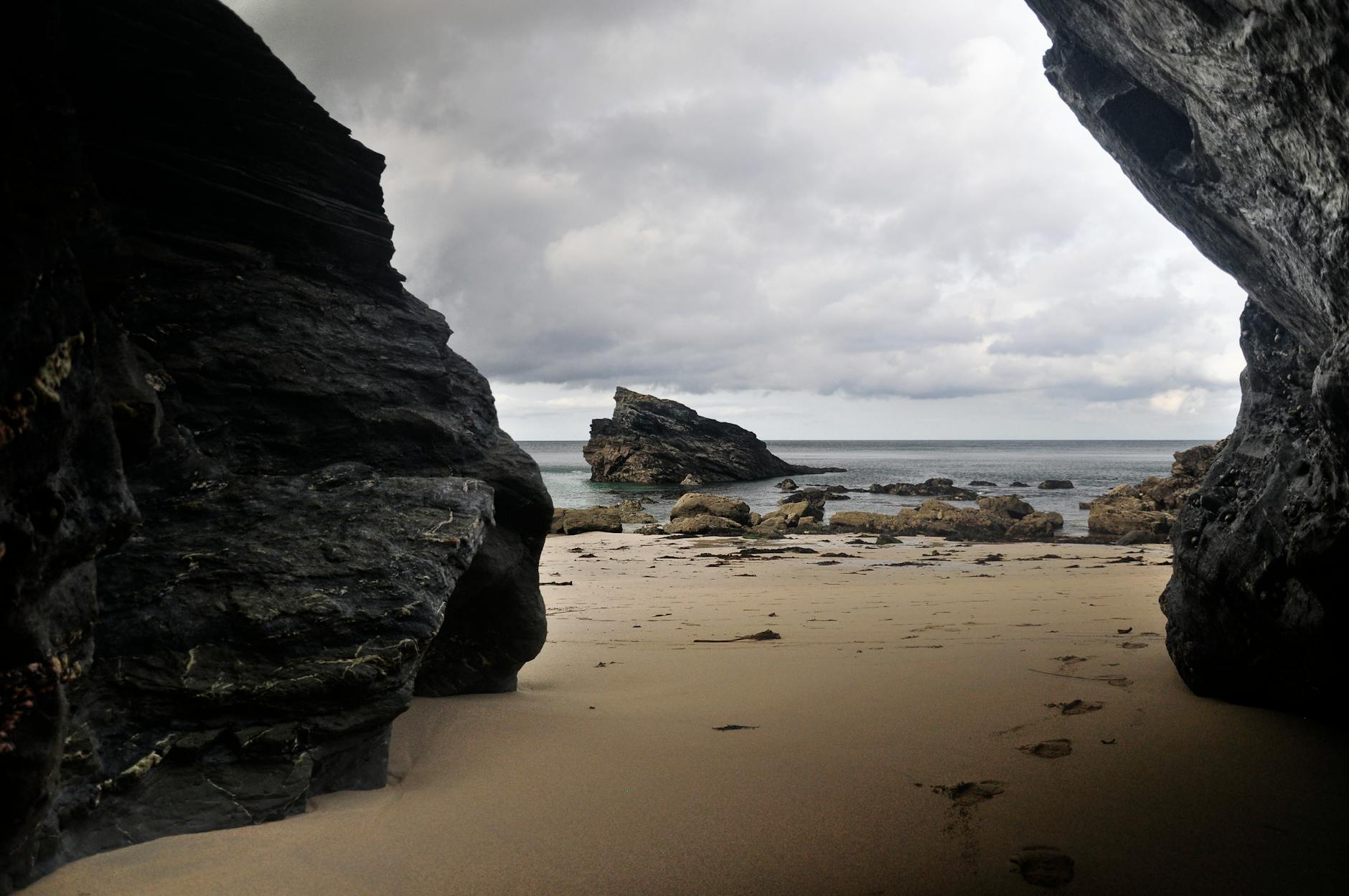 Hidden Cornish cove of the kind once used by smugglers landing contraband