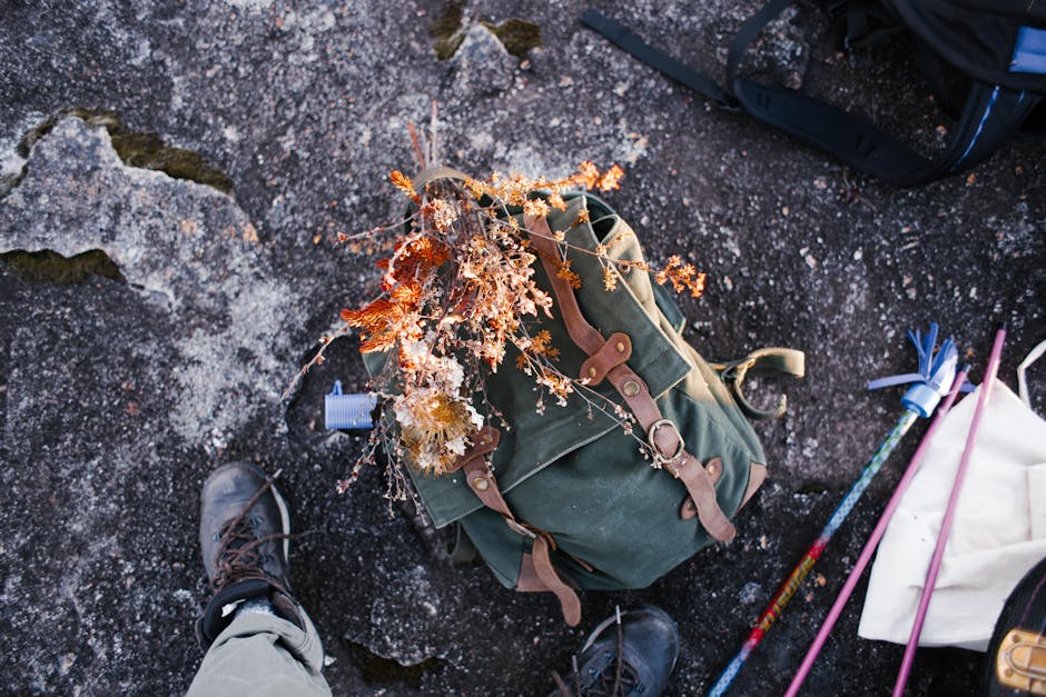 Hiking backpack on rocky path with autumn leaves — Cornwall walking