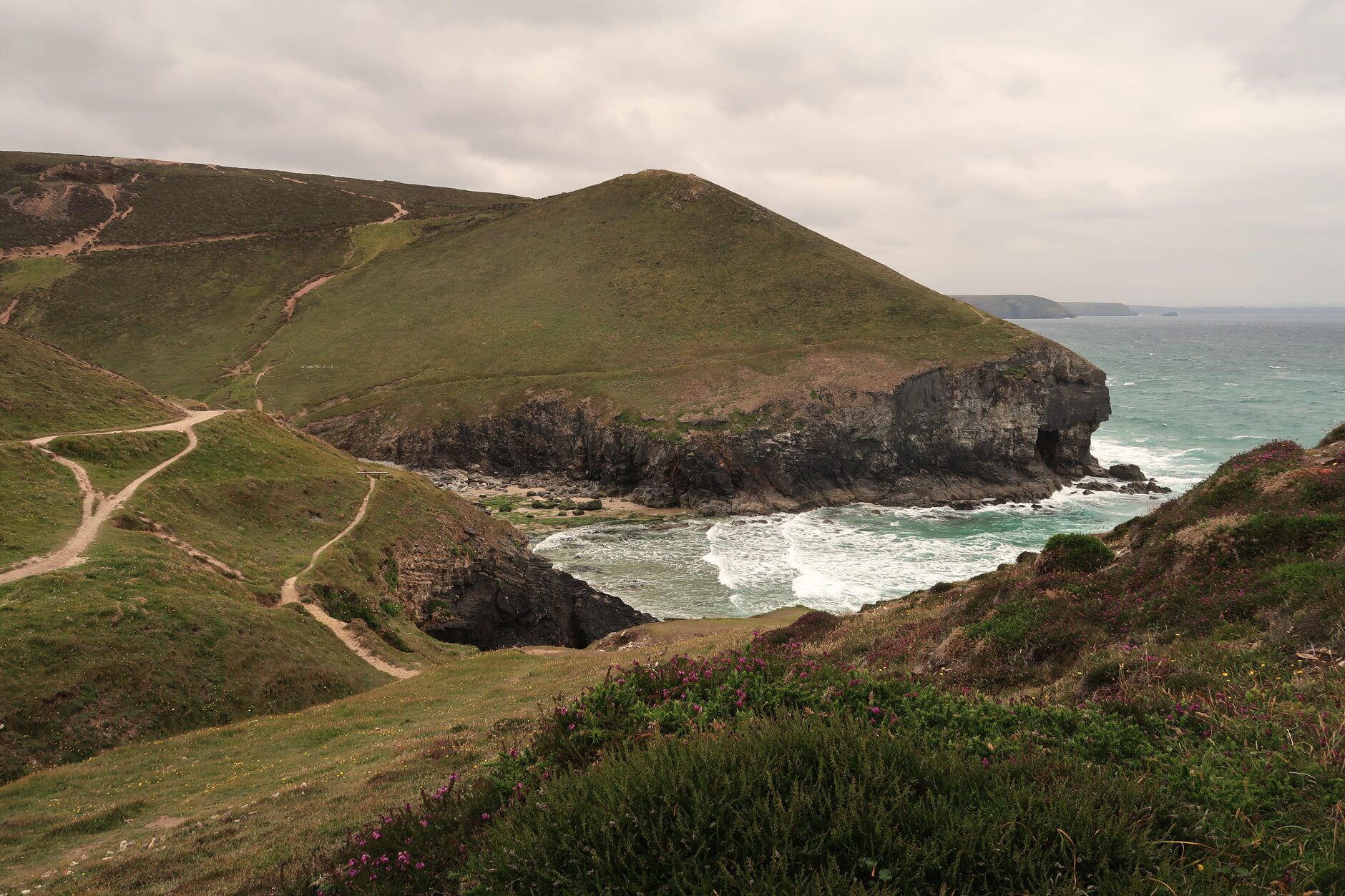 Waymarked South West Coast Path running along dramatic Cornish cliffs above the Atlantic