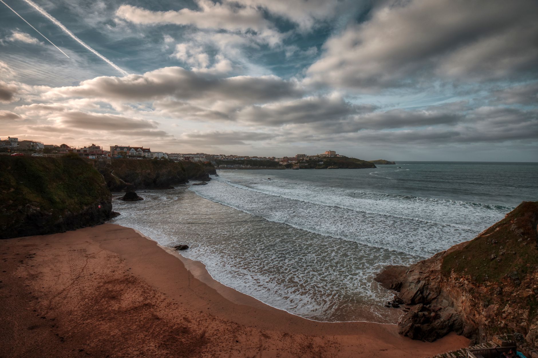 Wide sandy family beach in Cornwall on a bright summer day