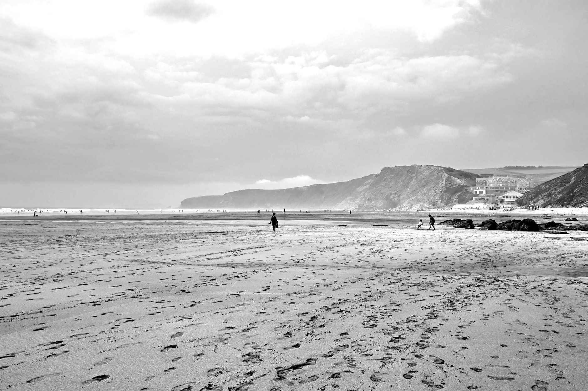 Wide sandy sweep of Watergate Bay under cliffs near Newquay