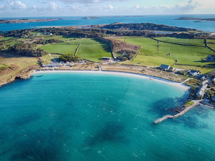 Turquoise water and pale sand at Old Grimsby beach on Tresco, Isles of Scilly